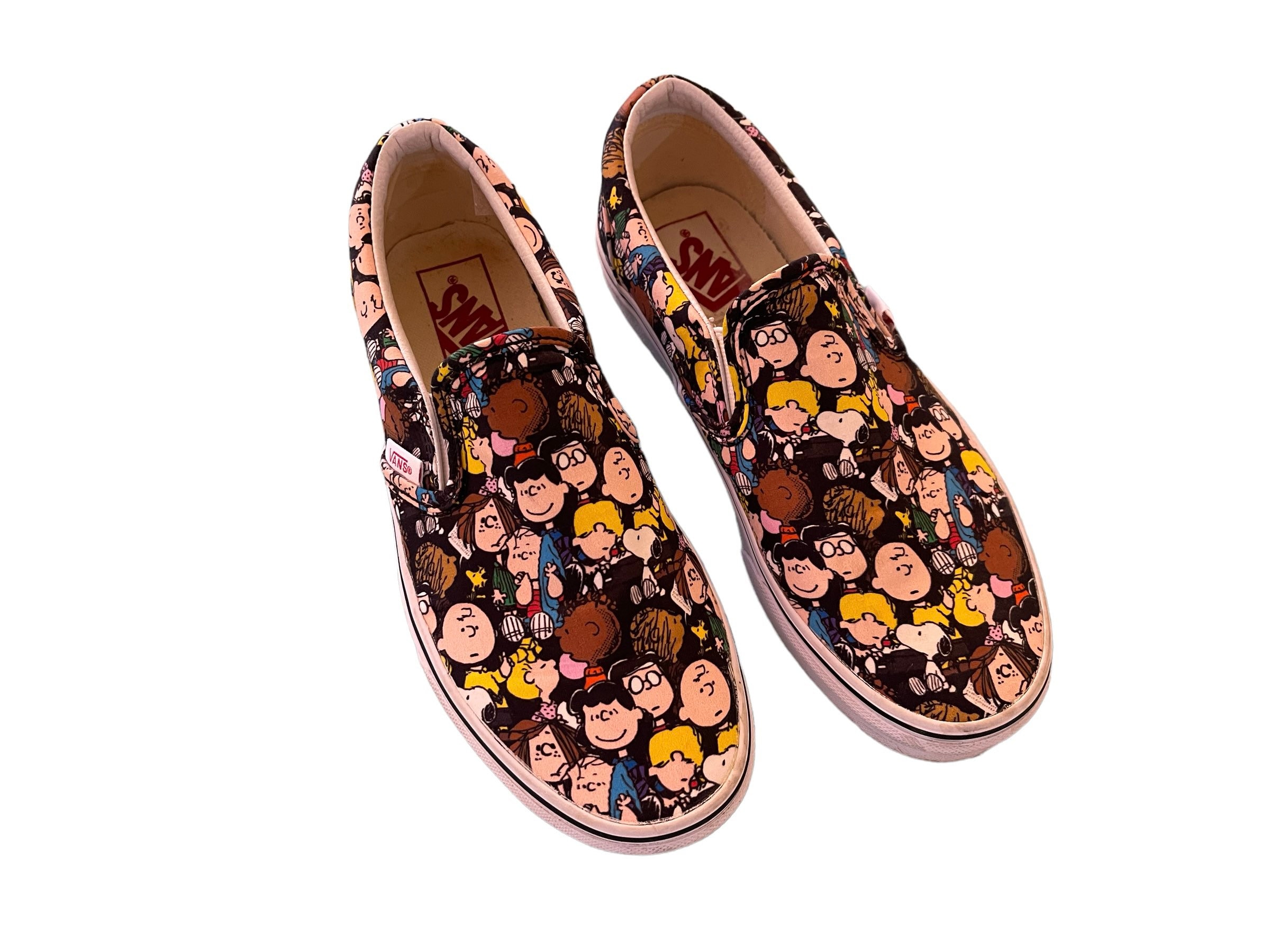 Vans peanuts slip on hotsell womens
