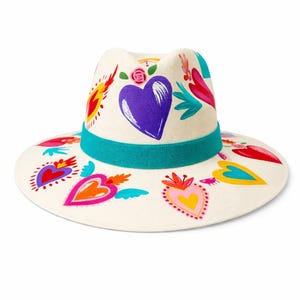 Mexican artisan hand painted fedora hat with hearts all over shown on clean white background by Bootsologie