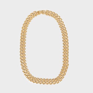 VINTAGE - Necklace with three golden chains with rectangular links.