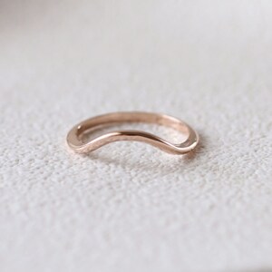 Minimalist arc ring in 14k rose gold, chevron wedding band
