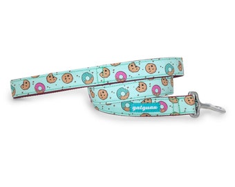 Dog Leash Cookies & Donuts. Printed on aquamarine background. Galguau Design, canine fashion.  Happy dog