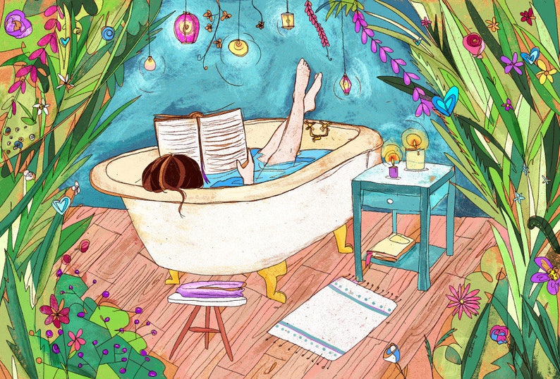 May include: A woman relaxes in a white bathtub with a book, surrounded by lush green plants and hanging lights. The bathroom floor is wood, and there is a small table with candles and a book next to the tub.