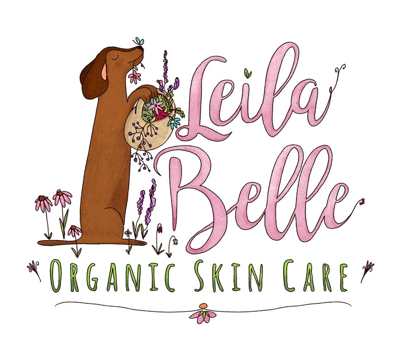 May include: A cartoon illustration of a brown dachshund dog holding a basket of flowers. The text "Leila Belle Organic Skin Care" is written in pink cursive lettering.
