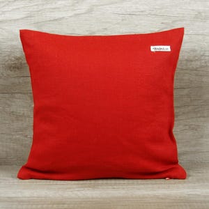 Clean reverse side of the handmade square red black personalized decorative pillow cover, demonstrating quality workmanship and fabric consistency throughout.