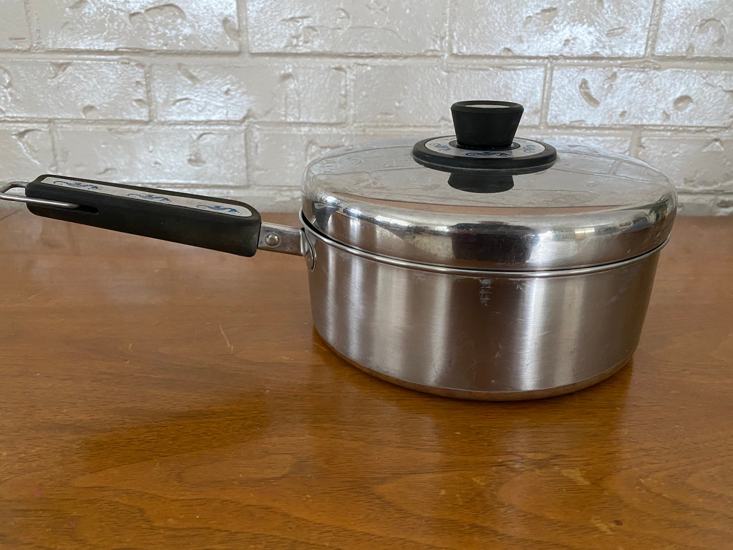 Sold at Auction: Pre-Owned Revere Ware Pots / Pans and More