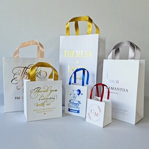 Buste di benvenuto per matrimoni con stampa a caldo. Lamina d'oro, d'argento e d'oro rosa. Buste per hotel per gli ospiti. Sacchetti di carta. Sacchetti per bomboniere. Bomboniere.