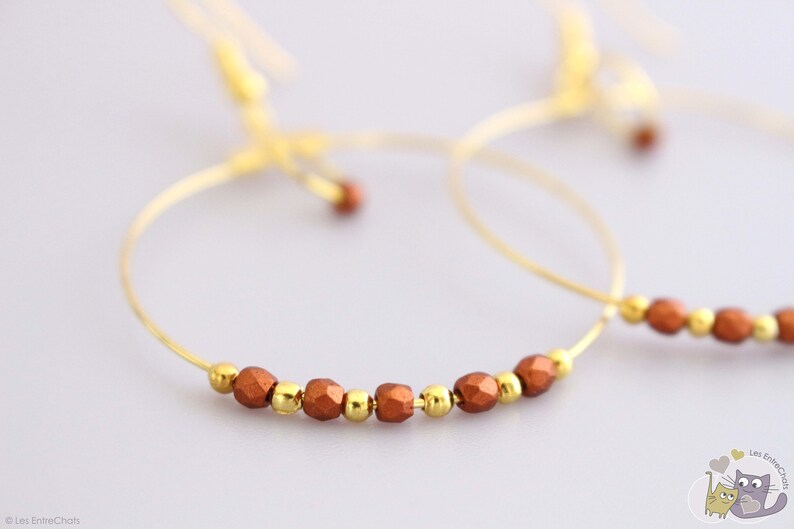 gold ring Earrings copper beads
