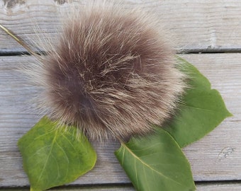 Recycled fur pompom on snap button