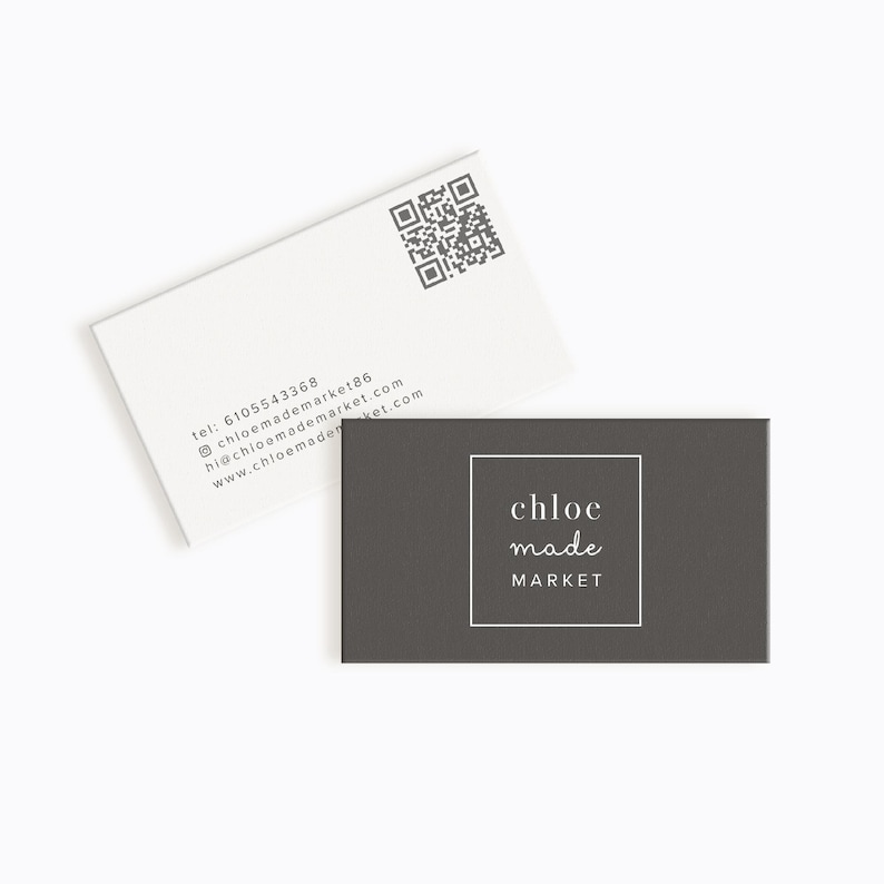 May include: A white business card with a black and white QR code and text that reads "tel: 6105543368  chloemademarket186  hi@chloemademarket.com  www.chloemademarket.com". A dark gray business card with a white border and the text "chloe made market" in white.