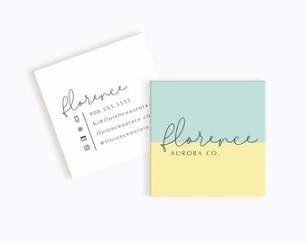 May include: A business card with a light blue and yellow background. The text on the card reads "florence aurora co."