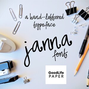 May include: A white background with office supplies, including paper clips, push pins, a pen, a pencil, a stapler, and a tape dispenser. The text "a hand-lettered typeface" and "janna font" is written in black cursive script. The text "GoodLife PAPER" is written in black sans-serif font.