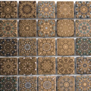 May include: A mosaic tile sheet with a geometric pattern in shades of brown, beige, and blue. The tiles are arranged in a grid pattern and feature intricate mandala designs.
