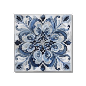 May include: A square tile with a blue and white floral pattern. The design is intricate and symmetrical, with swirling leaves and flowers.