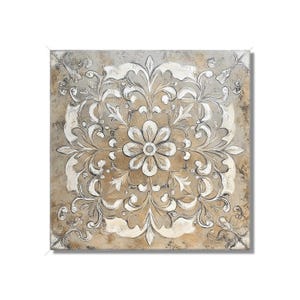 May include: Square wall art featuring a detailed floral design in shades of beige, white, and gray. The central flower is surrounded by ornate, swirling patterns. The artwork has a textured appearance, adding depth and visual interest.