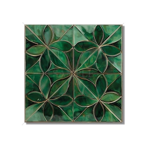 May include: A square tile with a geometric pattern of green and gold leaves. The tile is made of ceramic and has a glossy finish.