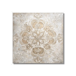 May include: Square wall art featuring a raised, ornate floral design in shades of beige and cream. The central motif is a large, symmetrical flower with detailed petals and surrounding scrollwork, creating a textured, dimensional effect.