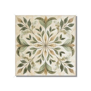 May include: A square, cream-colored canvas with a symmetrical pattern of green and brown leaves. The leaves are arranged in a circular pattern, creating a floral design.