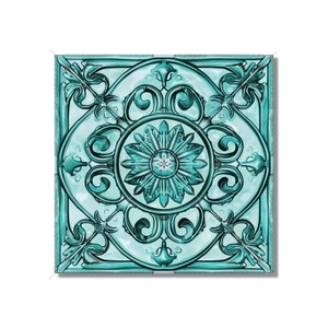 May include: A teal blue ceramic tile with an intricate floral design. The tile has a raised, embossed pattern and a glossy finish.