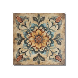 May include: Square wall art featuring a central floral design in shades of yellow, brown, and orange. The flower is surrounded by symmetrical, stylized leaves and scrollwork in teal and dark gray, set against a beige background.