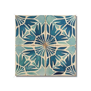 May include: Four blue and white ceramic tiles with a floral pattern. The tiles are arranged in a square, with each tile featuring a different part of the pattern.