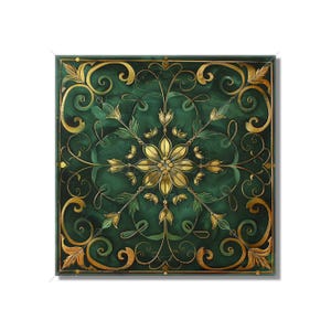 May include: A square green and gold decorative tile with a floral design. The tile has a central flower with gold petals and a green center. The flower is surrounded by smaller gold flowers and leaves.