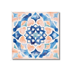 May include: A square tile with a blue and peach watercolor design. The design features a central mandala with intricate geometric patterns.