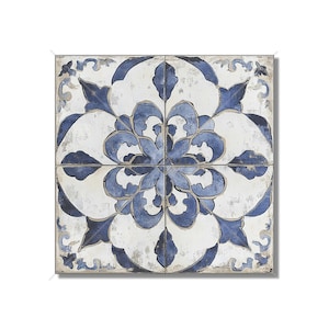 May include: A square wall tile arrangement consisting of four individual tiles featuring a symmetrical floral pattern in deep blue and off-white. The design displays a weathered, distressed finish with visible texture and faded blue pigment.