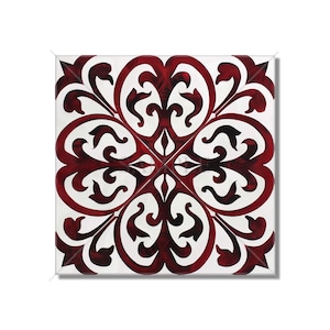 May include: A square tile with a red and white geometric pattern. The pattern is a stylized floral design with intricate details.