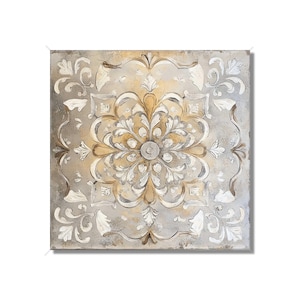 May include: Square wall art featuring a central floral design with intricate details. The artwork showcases a symmetrical pattern in shades of white, gold, and brown against a textured gray background. The piece has a vintage, antique aesthetic.