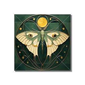 May include: A decorative square tile featuring a stylized moth design. The moth has cream-colored wings with green and gold accents, set against a dark green background. A gold-colored moon and circular frame complete the design.