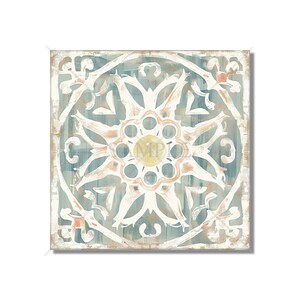 May include: A square, decorative tile with a white, blue, and orange floral design. The tile has a distressed, vintage look.
