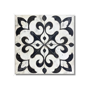 May include: Black and white patterned tile with a geometric design. The tile has a distressed look, giving it a vintage feel.