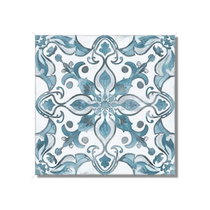 May include: A blue and white patterned tile with a floral design. The tile has a distressed look, giving it a vintage feel.