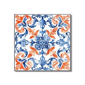 May include: A square tile with a blue and orange floral pattern. The design is symmetrical and features intricate details.