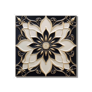 May include: A black and white square tile with a gold floral design. The center of the tile features a large, gold flower with a black center. The tile has a raised, 3D effect.