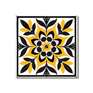 May include: A black and yellow geometric tile with a floral design. The tile has a white background and features a repeating pattern of black leaves and yellow petals.