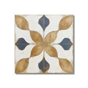 May include: Square decorative tile with a floral pattern. The design features four large, stylized gold-colored leaves and four blue teardrop shapes, set against a white background. The tile has a distressed, aged appearance.