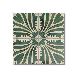 May include: A green and white ceramic tile with a symmetrical floral pattern. The tile has a traditional design with a central motif and radiating lines.