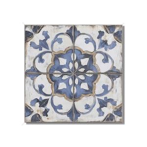 May include: A square tile with a blue and white floral pattern. The tile has a distressed, vintage look.