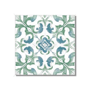 May include: A square tile with a repeating pattern of green and blue floral designs on a white background.
