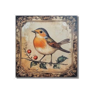 May include: A vintage-style painting of a robin perched on a branch with red berries. The painting is framed in a dark brown ornate frame with gold accents.