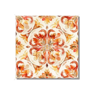 May include: A square tile with a repeating pattern of orange, yellow, and brown floral designs. The tile has a white background and a symmetrical design.
