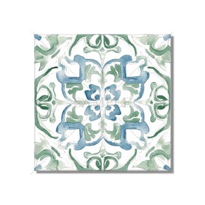 May include: A square tile with a blue and green watercolor pattern. The pattern is a repeating design of stylized leaves and flowers.