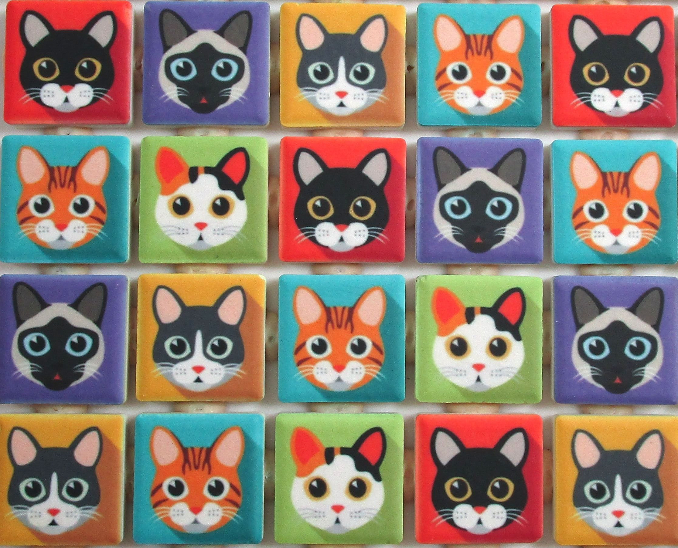 Cats of multi-floral print on decorative black ceramic tile wall hanging. 