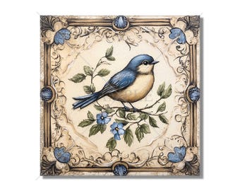 May include: A bluebird perched on a branch with blue flowers, surrounded by an ornate gold and blue frame.