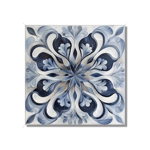 May include: A square tile with a blue and white floral design. The design is symmetrical and features intricate swirls and leaves.