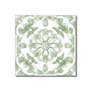 May include: A square tile with a green and white floral design. The tile has a repeating pattern of stylized flowers and leaves.