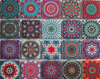 May include: A set of 16 colorful square ceramic tiles with intricate mandala designs. Each tile features a different pattern in shades of blue, red, pink, green, and white.