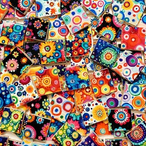 May include: A collection of square wooden tiles featuring vibrant, hand-painted floral and circular patterns in a wide array of colors including red, blue, yellow, orange, pink, and black. Each tile displays a unique, colorful design.