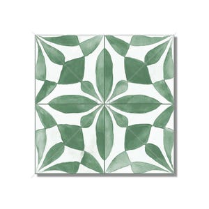 May include: A green and white ceramic tile with a geometric pattern of overlapping leaves. The tile has a watercolor-like effect, giving it a hand-painted look.